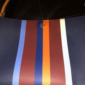 Tory Burch multi striped clutch bag with straps.